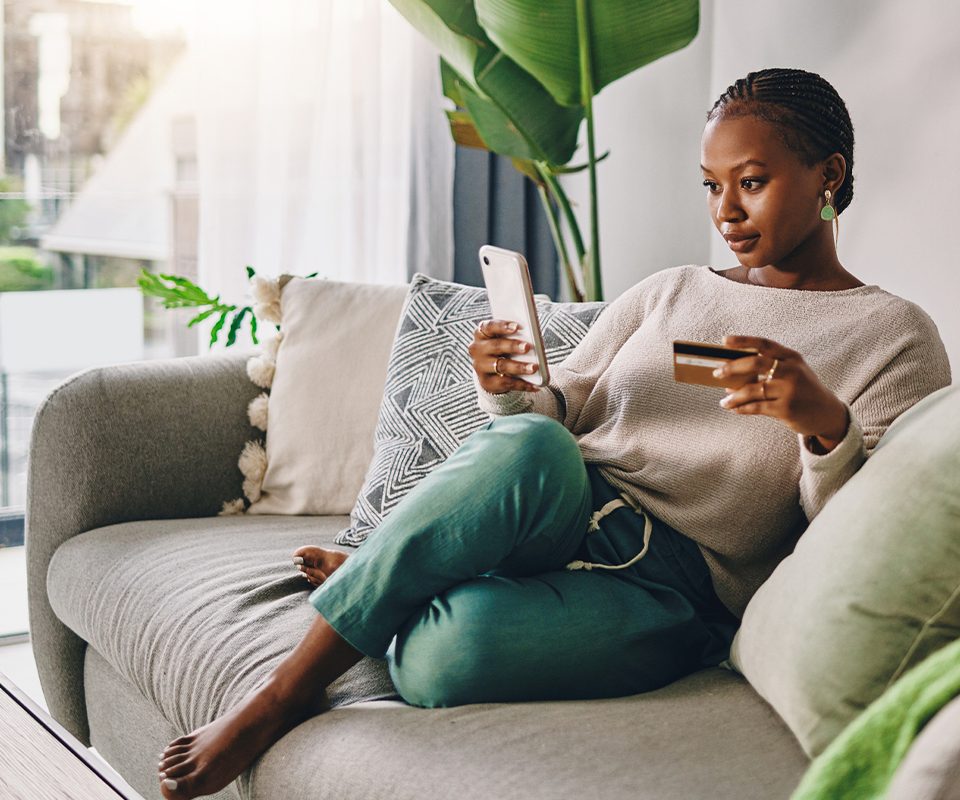 Woman completes an online form from home