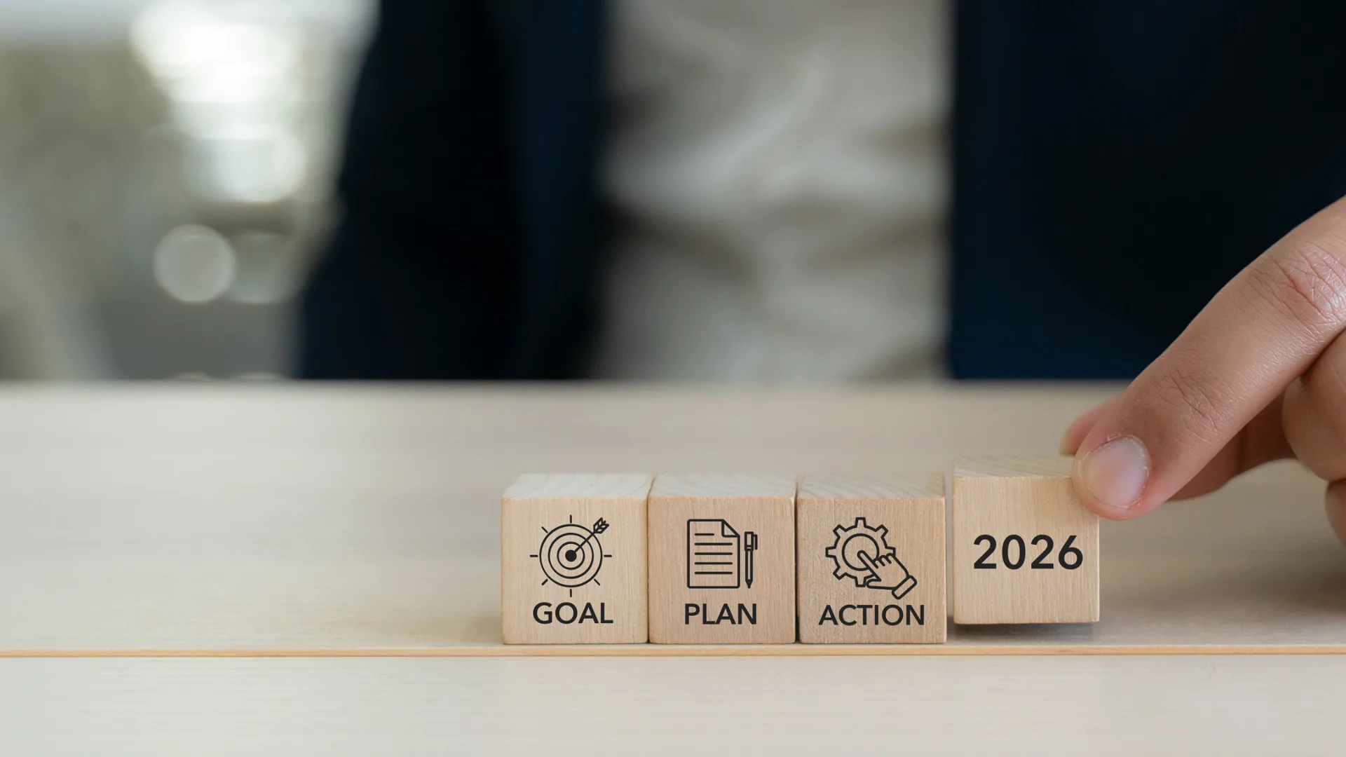 Person creating a financial checklist for the new year
